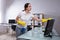 Janitor Cleaning Computer With Rag