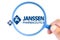 Janssen Pharmaceutica research laboratory logotype enlarged with a magnifying glass