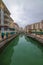 January 10 2020. Canal view in Venice-like Qanat Quartier of the Pearl precinct of Doha, Qatar, with multi-color