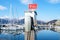 January 13, 2020, Tivat, Montenegro: Charging station EV for ecological Tesla vehicles or beach marina  as a background, with