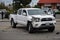 January 19, 2020: A white Toyota Tacoma truck sits in the middle of the road after an accident
