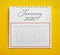 January 2020 calendar on yellow background, top view