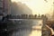 January 22, 2017 - Naviglio Grande, bridge crossed by tourists at sunset: bohemian meeting place of the city