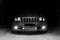 January 3, 2011. Kharkov, Ukraine. Jeep Grand Cherokee SRT8 in the shadows with glowing lights in low light.