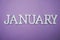 January alphabet letter with space copy on Purple background