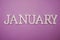 January alphabet letters on purple background