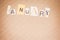 \\\'January\\\' month name on a paperboard background