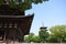 Japan ancient temple with green trees close up