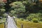 Japan Kyoto Tenju-an Temple garden with footpath and bridge