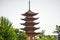 Japan pagoda closeup over white sky