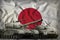 Japan tank forces concept on the national flag background. 3d Illustration