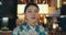 Japan, woman and face in town in kimono, urban outdoor and happiness in street for heritage pride. Person, smile