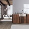 Japandi trendy kitchen and living room in white and beige tones. Dark wooden cabinets, contemporary fabric sofa. Minimalist