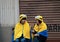 Japanese adolescent of girl and boy in hood and blanket of minion at Universal Studios Japan..