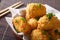 Japanese appetizer: potato korokke close up in a bowl. Horizontal