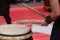 Japanese artist playing on traditional taiko drums