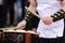 Japanese artist playing on traditional taiko drums