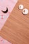 Japanese backgound. chopstick stands with the image of a moon rabbit on the background of a bamboo mat and pink fabric in a