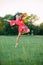 Japanese ballerina dances on lawn background