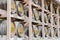 Japanese Barrels of Wine wrapped in Straw stacked on shelf