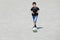 Japanese boy dribbling soccer ball