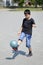 Japanese boy playing football juggling