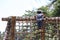 Japanese boy playing with rope ladder