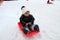 Japanese boy on the sled