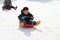 Japanese boy on the sled