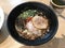 Japanese braised pork belly noodle served in black creamy Japanese pork bone broth.