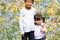 Japanese brother and sister and flower garden