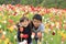 Japanese brother and sister and tulip field
