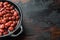 Japanese canned food ingredient, sweet red bean, on old dark  wooden table background  with copy space for text