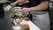 Japanese chef cooking ramen noodles at restaurant