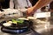 Japanese chef deliberately preparing