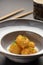 Japanese chinese fried chicken or fish tempura on a blue ceramic plate and chopstick