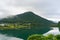 Japanese countryside landscape with rural village and river in the mountains