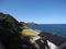 Japanese countryside rocky coast seaside with building and fields