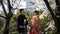 Japanese couple wearing a kimono. Cherry blossom park next to Hiroshima castle.