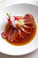 Japanese cuisine beef tataki poured with soy sauce