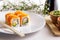 Japanese cuisine california maki sushi on white plate