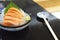 Japanese cuisine with copy space, Raw Salmon Sashimi with Wasabi on black bowl.