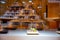 Japanese cuisine, modern restaurant with sushi, sashimi, other Japanese dishes served on moving belt across restaurant, self-