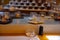 Japanese cuisine, modern restaurant with sushi, sashimi, other Japanese dishes served on moving belt across restaurant, self-