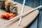 japanese cuisine sushi sauce chopsticks wood board