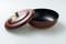 Japanese decorated brown lacquered wood bowl with lid