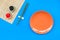 Japanese food cooking set with soy sauce, ginger, plate, bamboo sticks on blue background top view copy space