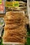 Japanese food display on a market stand. Dried squid