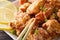 Japanese food: fried chicken karaage with lemon and green onion