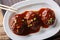 Japanese food: hamburg steak or hambagu with a spicy sauce on a